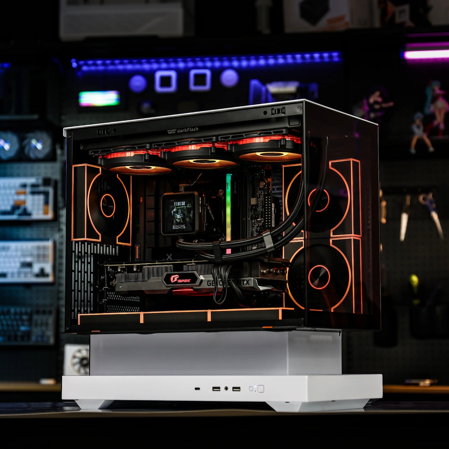 Open computer case with visible hardware on a dark background