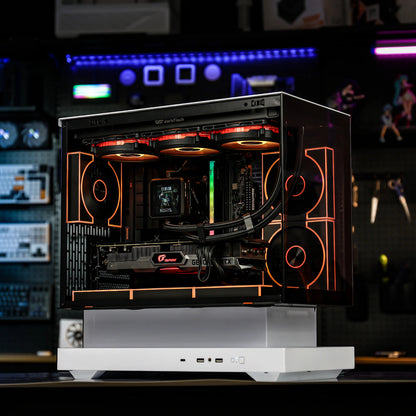 Open computer case with visible hardware on a dark background